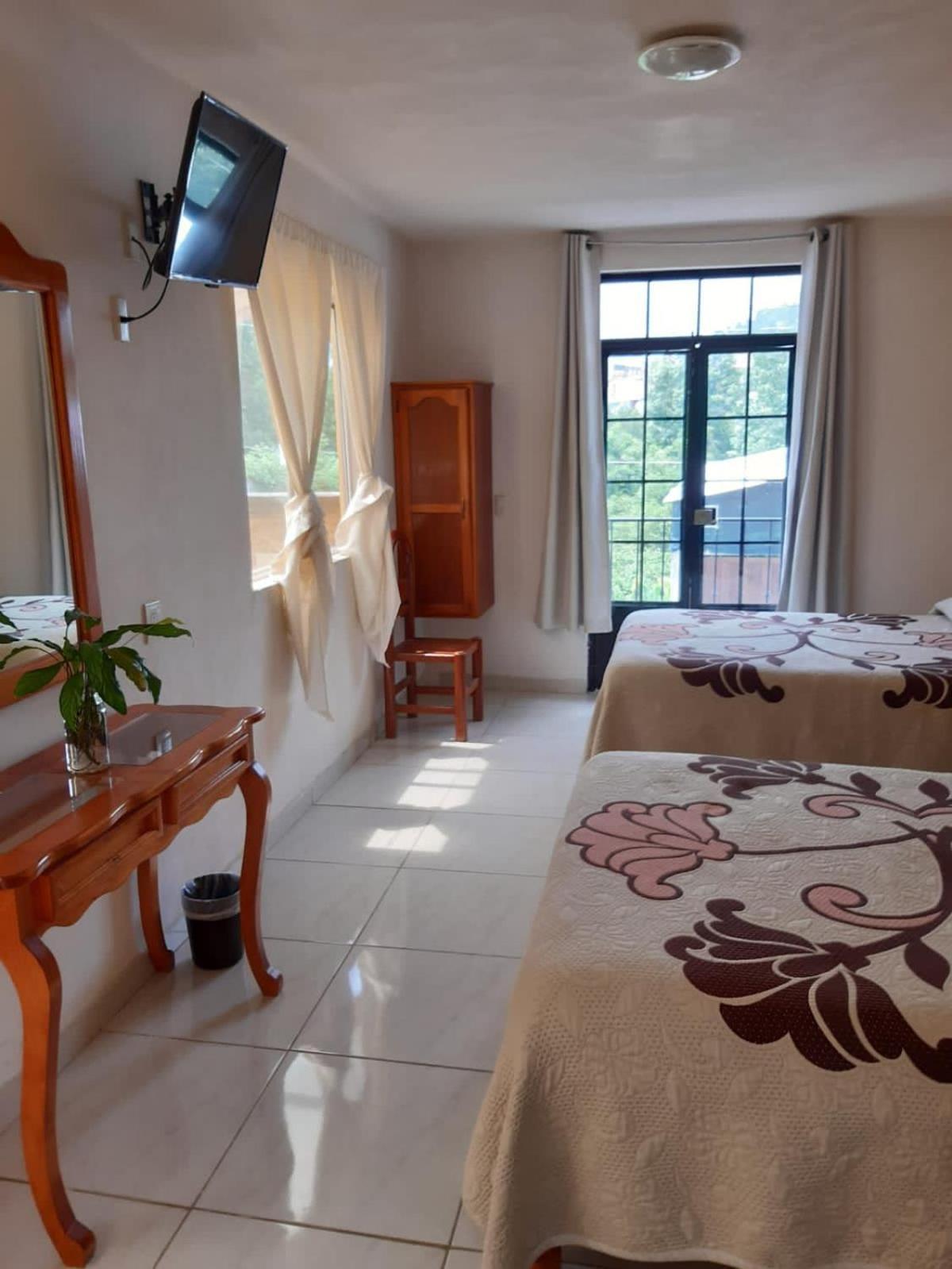 Hotel Camelinas Area Blanca Пацкуаро Экстерьер фото